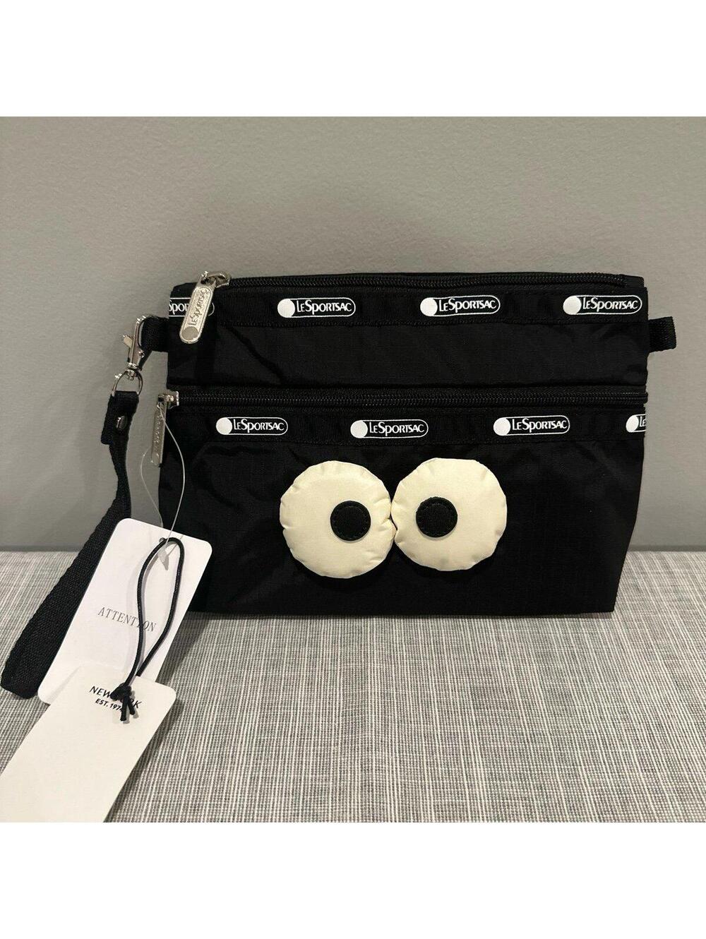 Lesportsac black eyes 2zipper wristlet cosmetic clutch NWT